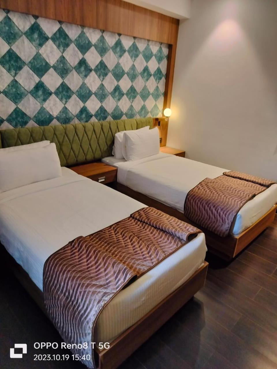 Mandarin Sky Hotel Kannur Buitenkant foto