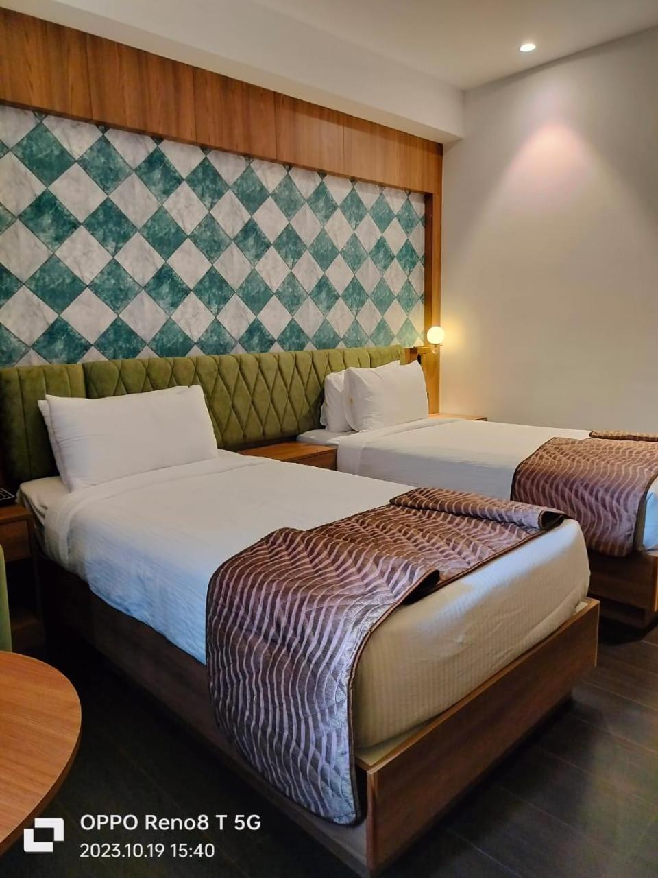 Mandarin Sky Hotel Kannur Buitenkant foto