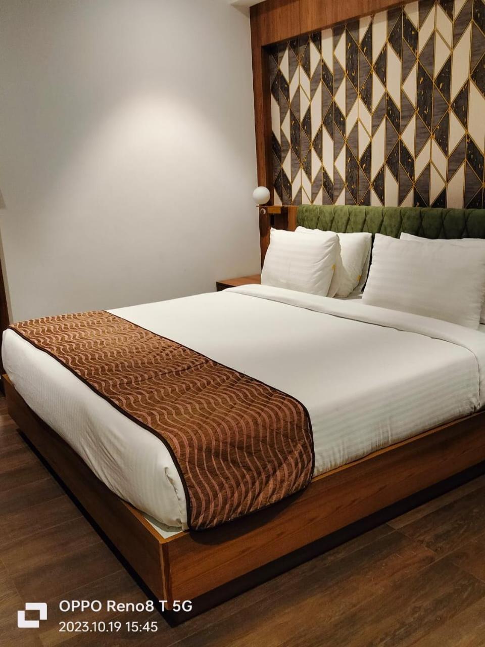 Mandarin Sky Hotel Kannur Buitenkant foto